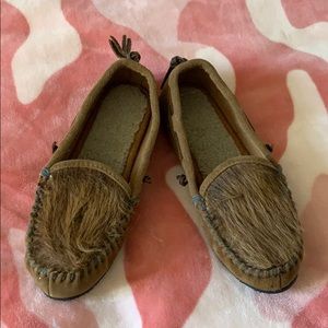 Tan moccasins - never worn. Like new condition.